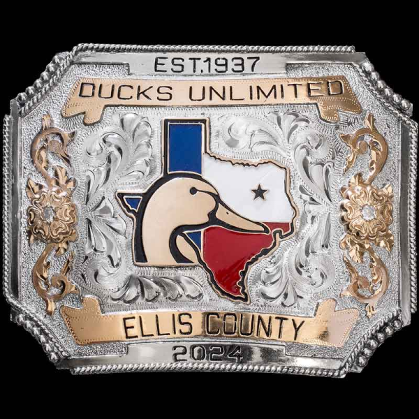 The Ennis belt buckle is a fancy silver belt buckle with bronze details crafted on a unique silver base. Customize this silver belt buckle now!